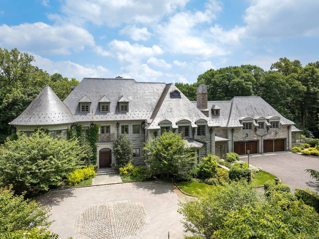 This spectacular limestone French Manor estate sits on 10 acres on Converse Lake with 100' of lakefront in the beautiful and secluded Conyers Farm, a guard gated community with private ...