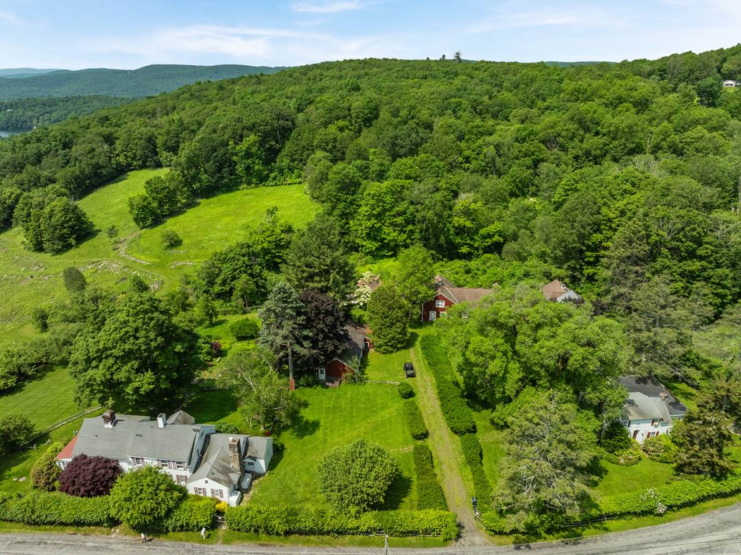 A once in a lifetime opportunity to own a significant estate overlooking Lake Waramaug.