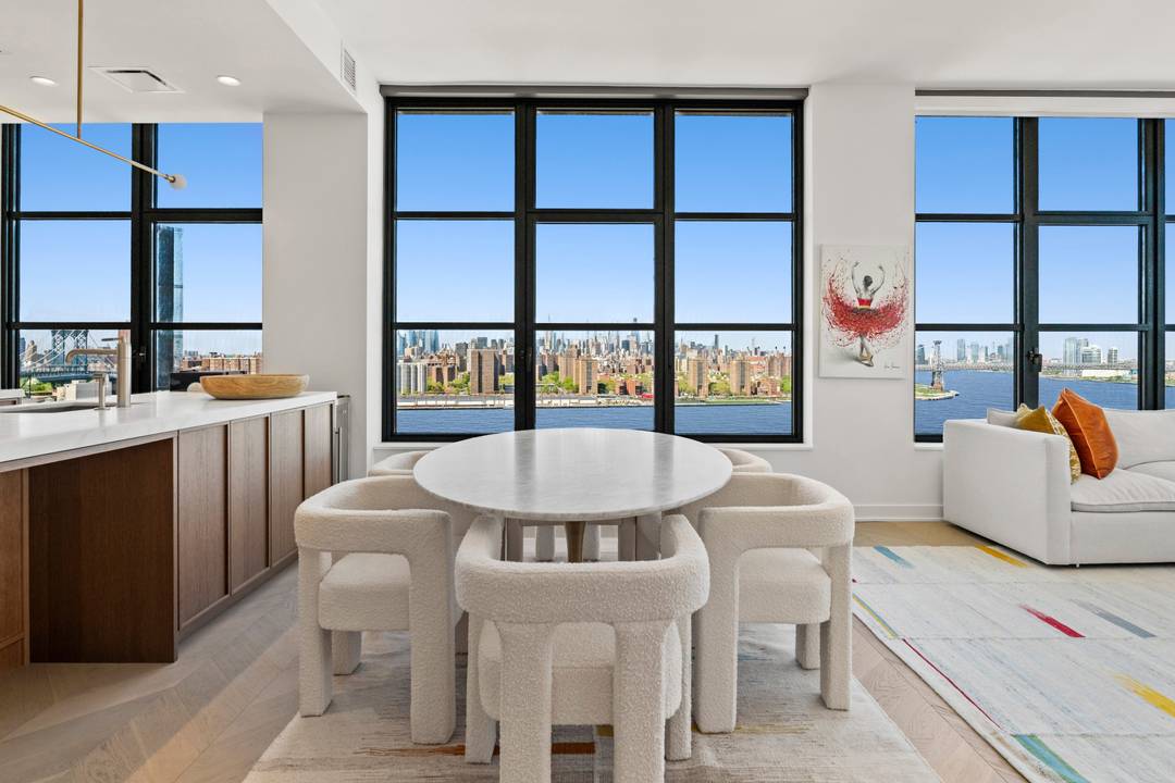 Enjoy breathtaking skyline views from this modern high-floor home with elegant finishes