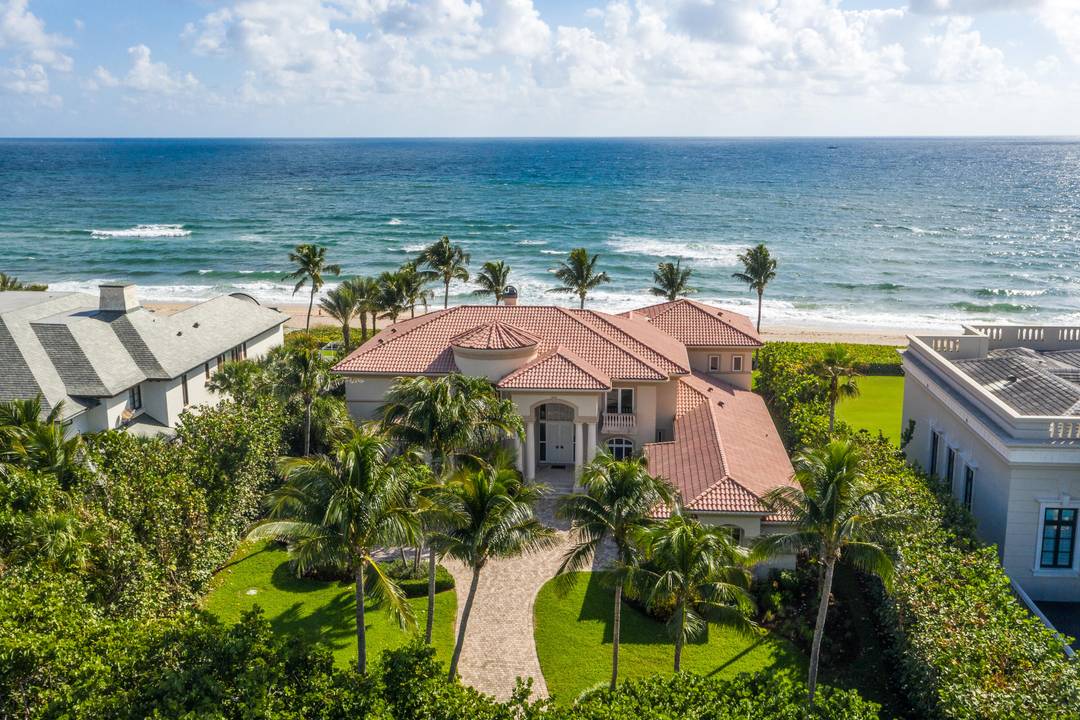 Nestled within the charming Town of Ocean Ridge, this Oceanfront Estate offers an unparalleled blend of privacy, sophistication, and coastal splendor.