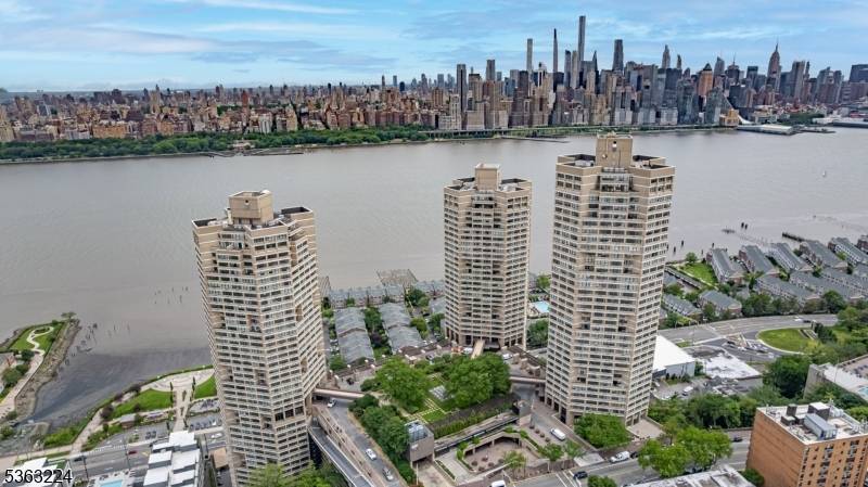 Welcome to this luxury modern condo at Galaxy Towers, a fully renovated 2 bedroom, 2.