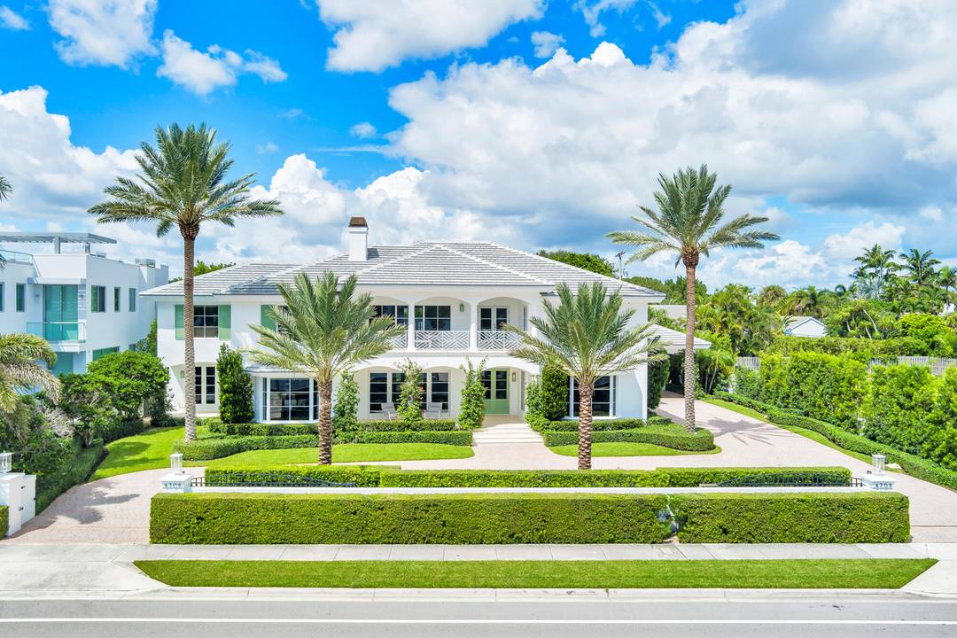 Situated on a rare. 45 acre lot on the Intracoastal Waterway with its own private dock, this expansive 5 bedroom, 5.