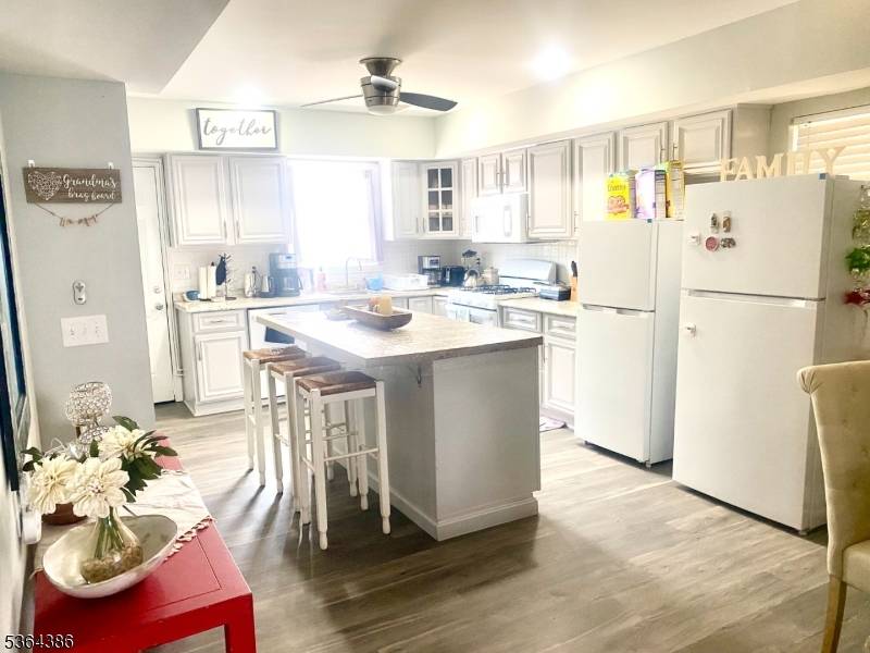 This stunning, fully furnished spacious beach house offers an unparalleled coastal living experience, perfectly positioned to capture breathtaking views of both the sparkling ocean and an impressive waterpark.