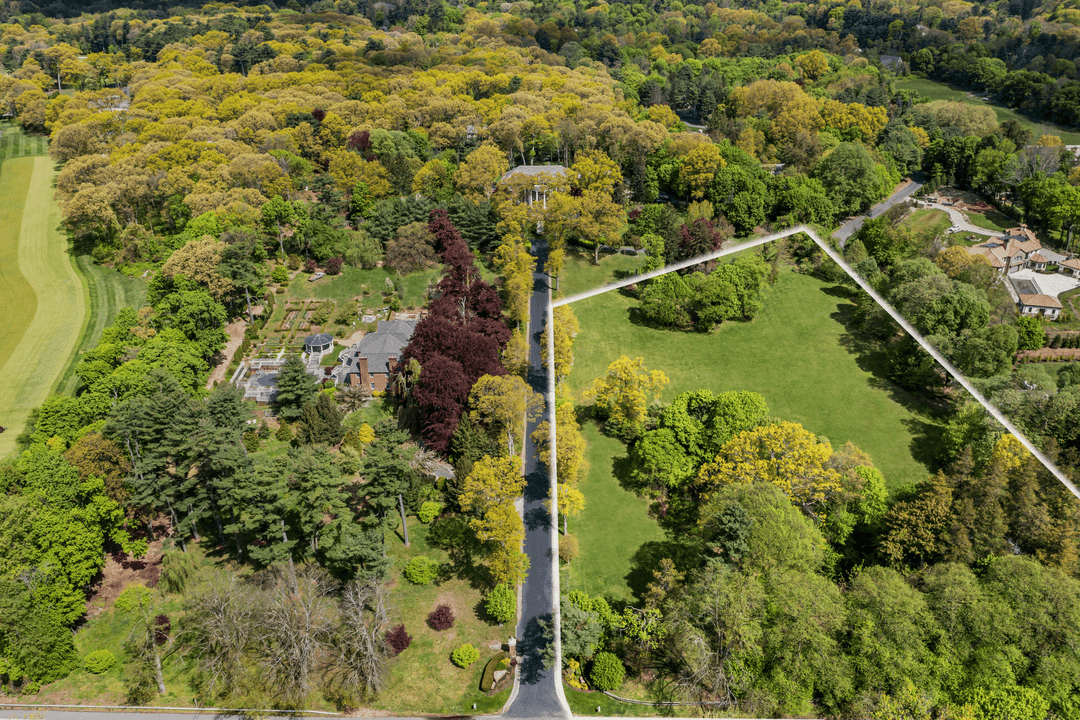 Incredible Land Opportunity on 4 Acres in the Heart of Muttontown